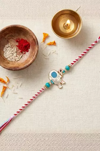 space theme kids rakhi with roli chawal and raksha bandhan card