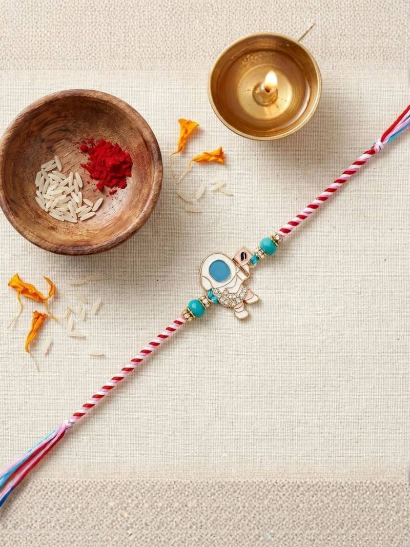 space theme kids rakhi with roli chawal and raksha bandhan card