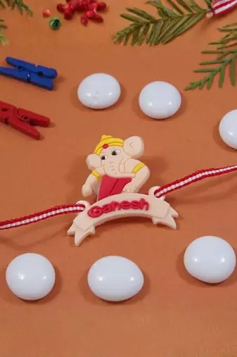 cute ganesha theme kids rakhi with roli chawal and raksha bandhan card