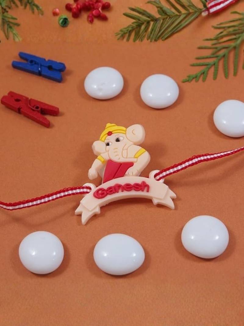 cute ganesha theme kids rakhi with roli chawal and raksha bandhan card