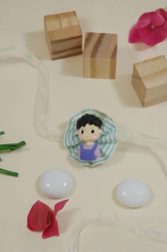 kids cartoon rakhi with roli chawal and raksha bandhan card