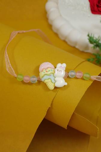 kids cartoon rakhi with roli chawal and raksha bandhan card