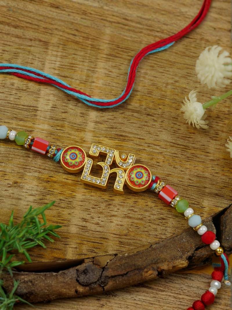 om designer rakhi with roli chawal and raksha bandhan card