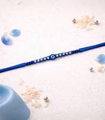 evil eye theme designer rakhi with roli chawal and raksha bandhan card