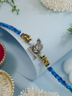ganesha designer blue rakhi with roli chawal and raksha bandhan card 1