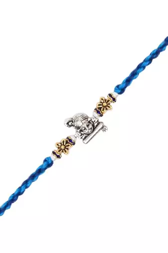 ganesha designer blue rakhi with roli chawal and raksha bandhan card