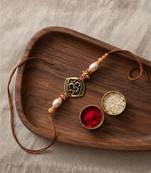 om designer rakhi with roli chawal and raksha bandhan card