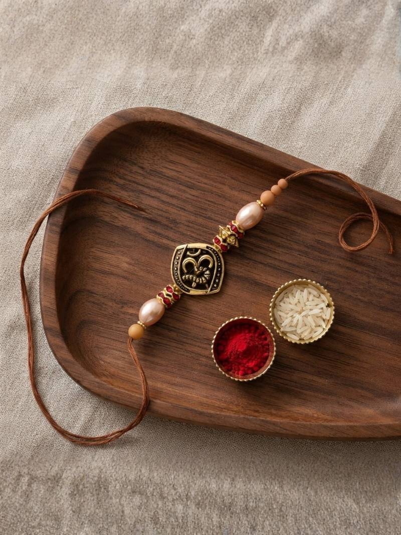 om designer rakhi with roli chawal and raksha bandhan card