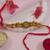 ganesha designer rakhi with roli chawal and raksha bandhan card