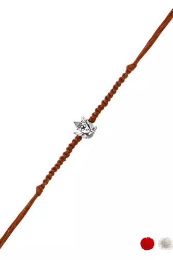 ganesha design rakhi with roli chawal and raksha bandhan card