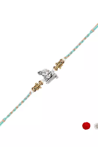 ganesha design rakhi with roli chawal and raksha bandhan card