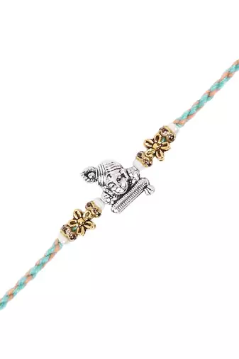 ganesha design rakhi with roli chawal and raksha bandhan card