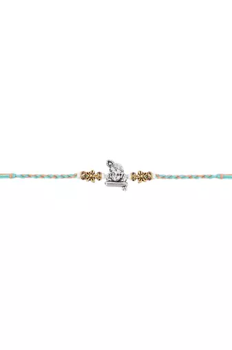 ganesha design rakhi with roli chawal and raksha bandhan card