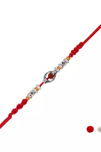 rudraksha designer rakhi with roli chawal and raksha bandhan card