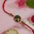 krishna flute designer rakhi with roli chawal and raksha bandhan card