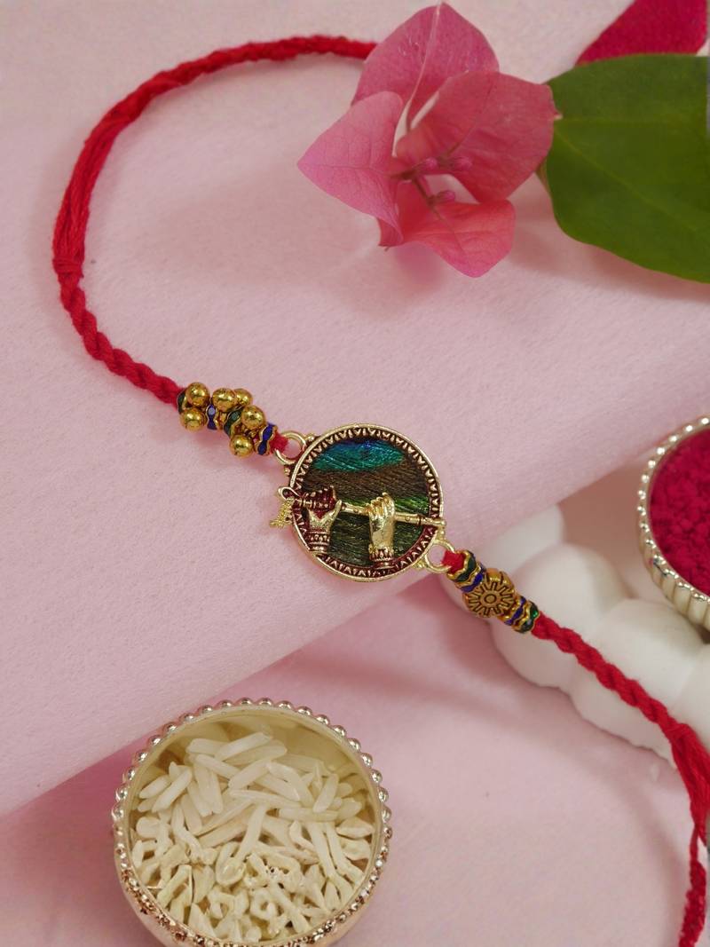krishna flute designer rakhi with roli chawal and raksha bandhan card
