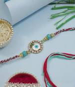 evil eye designer rakhi with roli chawal and raksha bandhan card