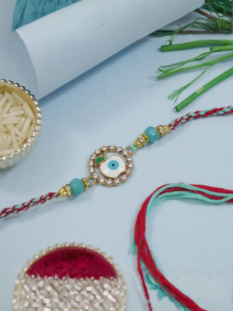 evil eye designer rakhi with roli chawal and raksha bandhan card