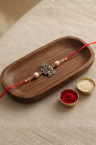 radha krishna designer rakhi with roli chawal and raksha bandhan card