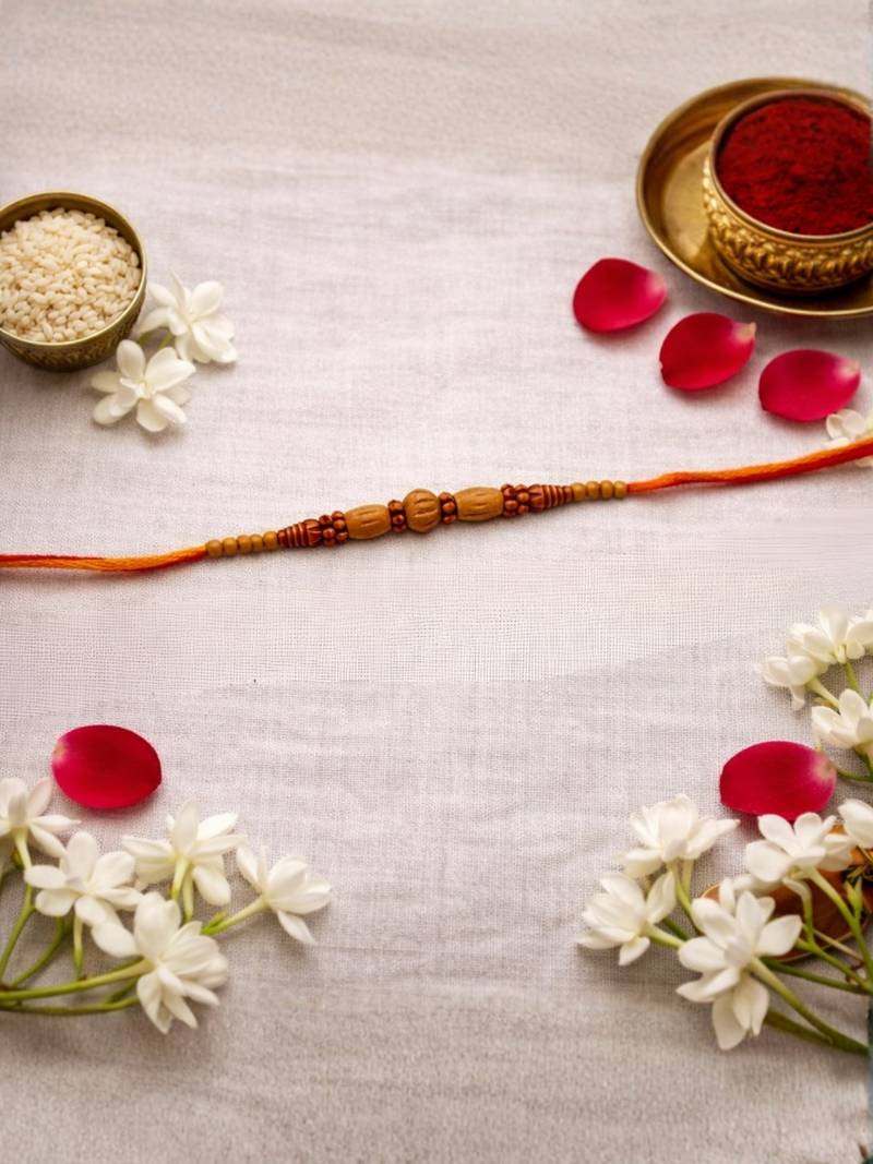 wooden bead designer rakhi with roli chawal and raksha bandhan card