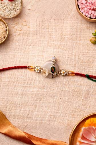 designer rakhi with roli chawal and raksha bandhan card