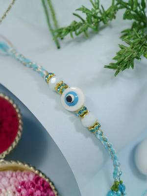 evil eye theme designer rakhi with roli chawal and raksha bandhan card 1