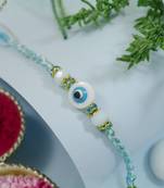 evil eye theme designer rakhi with roli chawal and raksha bandhan card