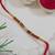 beaded design rakhi with roli chawal and raksha bandhan card