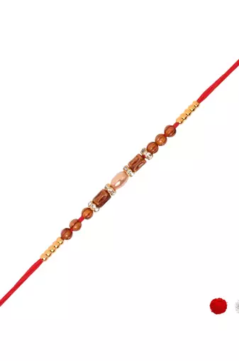 beaded design rakhi with roli chawal and raksha bandhan card