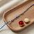 evil eye theme designer rakhi with roli chawal and raksha bandhan card