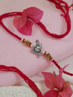 krishna designer red rakhi with roli chawal and raksha bandhan card 1