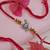krishna designer red rakhi with roli chawal and raksha bandhan card