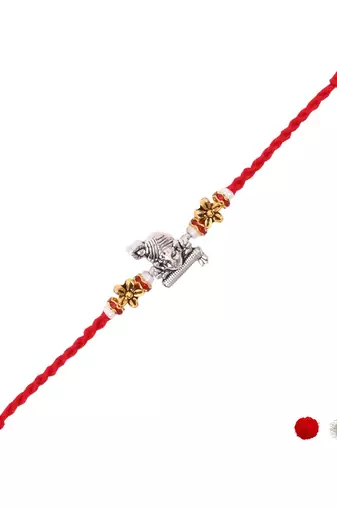 krishna designer red rakhi with roli chawal and raksha bandhan card