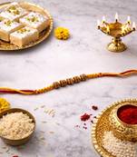 wooden bead designer rakhi with roli chawal and raksha bandhan card