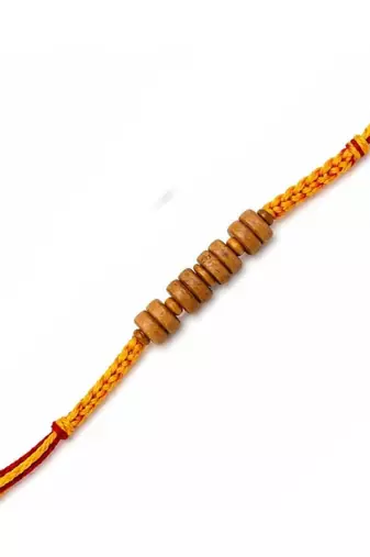 wooden bead designer rakhi with roli chawal and raksha bandhan card
