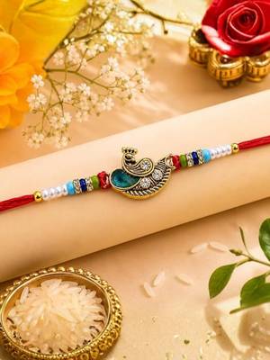 peacock designer red rakhi with roli chawal and raksha bandhan card 1