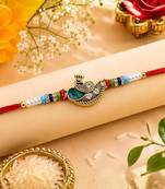 peacock designer red rakhi with roli chawal and raksha bandhan card