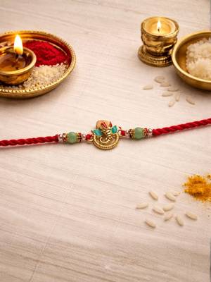 ganesha designer red rakhi with roli chawal and raksha bandhan card 1