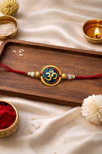 om designer rakhi with roli chawal and raksha bandhan card