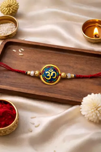 om designer rakhi with roli chawal and raksha bandhan card