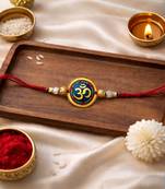 om designer rakhi with roli chawal and raksha bandhan card