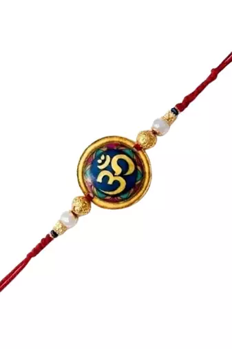 om designer rakhi with roli chawal and raksha bandhan card