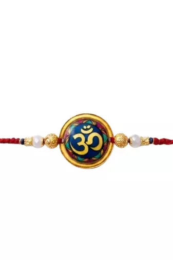 om designer rakhi with roli chawal and raksha bandhan card