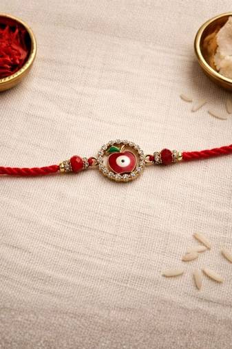 evil eye designer rakhi with roli chawal and raksha bandhan card