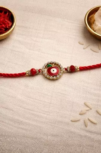evil eye designer rakhi with roli chawal and raksha bandhan card