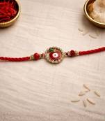 evil eye designer rakhi with roli chawal and raksha bandhan card