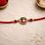 evil eye designer rakhi with roli chawal and raksha bandhan card