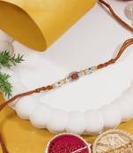 rudraksha designer rakhi with roli chawal and raksha bandhan card