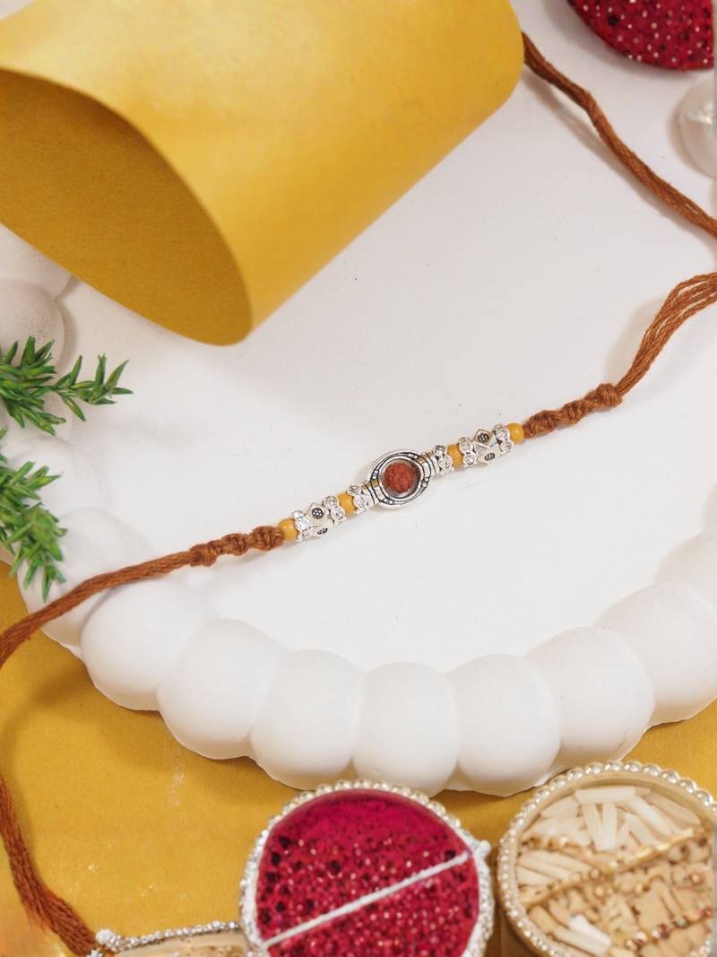 rudraksha designer rakhi with roli chawal and raksha bandhan card