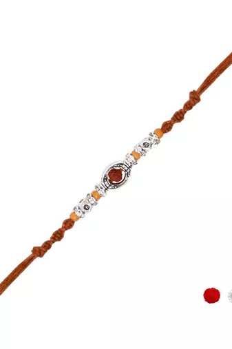 rudraksha designer rakhi with roli chawal and raksha bandhan card